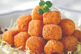 炸：利用滚烫食用油烹调食物的方法，易学难精图片