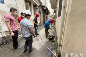 社区吹哨 还路于民 番禺区市桥街瑞和园31处私装地锁被强制拆除图片