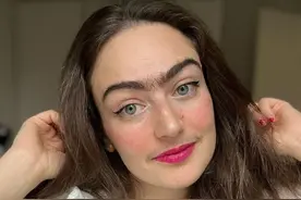 丹麦女子天生毛发旺盛，不愿意去掉，晒出胡子感觉很自在图片