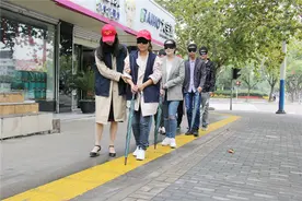 也谈为啥街上不见一个盲人？图片