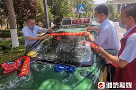 热血仗义诚信……“的哥”名片越来越亮眼图片