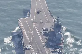 日本军机跟拍辽宁舰，甲板上水兵清晰可见，解放军为何不拦截？图片