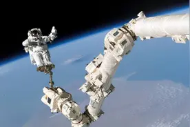 空间站只飞400公里高，是何原因？为什么不再飞得高点呢？图片