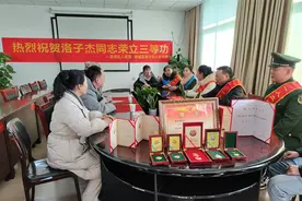 洛阳孤儿参军报党恩 立功喜报传家乡图片