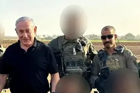 英媒：以色列一男子冒充特种兵混进前线，还跟内塔尼亚胡合影图片