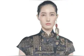 商周龙虎兔“变身”耳间配饰手中包图片