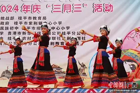 桂平市师生开展民族特色活动迎接“三月三”图片