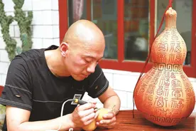 峰峰“葫芦哥”，烙笔生花送“福禄”图片