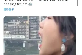 来重庆“吞”列车  外交部发言人邀全球打卡重庆“轨道穿楼”图片