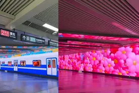 “樱花”霸屏武汉街道口站换乘通道，行人驻足拍照：非常漂亮，把武汉风情全体现出来了图片