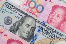 1月人民币对美元中间价微跌0.3%，即期汇率跌1.23%图片