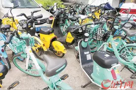 广州两名男子骑共享电单车被罚引争议 记者街头走访调查图片