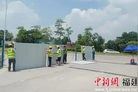 助力产业发展国道358线晋江一路段实施“白改黑”路面改造图片