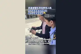 武昌城管队员玩转无人机，空中巡查餐馆排烟口是否远离居民楼图片
