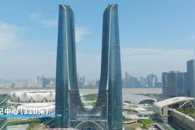亚运背后的浙江制造⑭杭州最新地标，“杭州之门”柔性悬垂屋面系全国首例图片