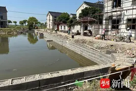 “我为群众办实事”常熟市董浜镇观智村加固夹水坝，消除圩区险段图片