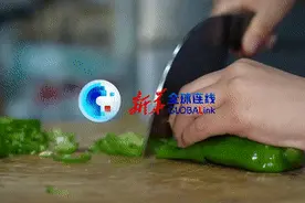 全球连线｜中国小学生“花式”炒菜掀起劳动“热”图片