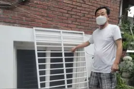 中国男子暴雨中勇救韩国老夫妇 韩媒：救人于危难 是义士图片