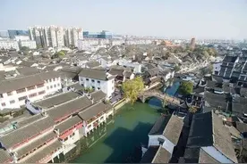 红烧羊肉由甜变咸、塘桥的棚搭了又拆……这些故事藏着七宝老街的前世今生图片