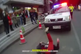 广西一女子无证闯红灯还撒泼打滚：“为什么不给我一次机会！”图片
