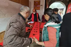 南靖：送“福”送春联 福气进土楼图片