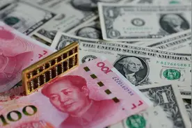 5月人民币对美元即期汇率下跌2.57%，一度跌破7.11关口图片