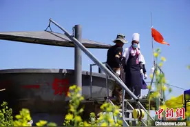 新疆昌吉州第二届油菜花观光旅游节开幕（图）图片