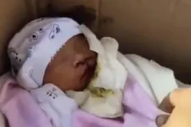 玉林一男婴被装纸箱抛弃？当地政府：已送医检查，暂未找到父母图片
