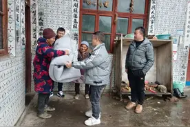 寒冬送温暖 棉被暖身更暖心图片