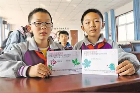 宁夏新疆两地小学生千里寄信叙友谊图片
