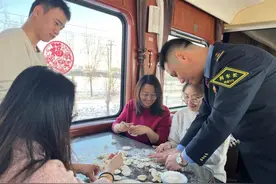 知年俗、品年味，Z174次列车上庆“小年”图片