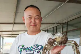 一片盐碱地何以“长出”大闸蟹图片
