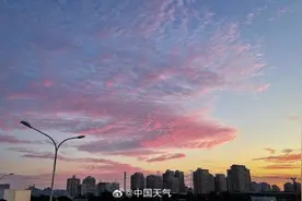 北京现梦幻粉色鱼鳞云朝霞图片