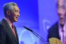 李显龙的“中国缘”：从小接受12年华语教育，任内14次到访中国图片