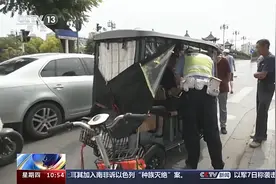 电动自行车加装风挡雨篷：不利于避险，还增加事故发生率图片