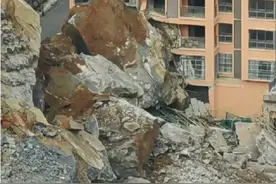 遵义一小区深夜施工导致巨石滚落砸坏楼房，当事人：像地震一样，整栋人已撤离图片