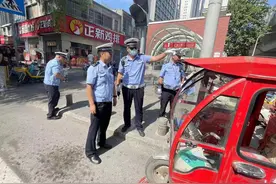 西安港浐交警二中队开展两轮、三轮电动车专项整治图片