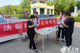 济宁高新区柳行街道绿色家园社区开展反邪教主题宣传活动图片