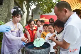 一把漆扇迎大暑——非遗漆扇迎夏新风尚图片