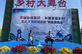 乌鲁木齐市水磨沟区举办首届“阿肯弹唱会”图片