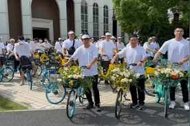 新一批慢行交通品质提升项目将在年底前建成！世界无车日，百人骑行同游黄浦滨江图片