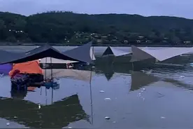 露营游客一觉醒来睡在水里？昆明一网红景区工作人员：雨太大我们也没想到图片