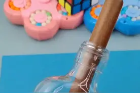 经典的益智烧脑拓扑谜题，你能想到木棒装进去的方法吗 #思维训练 #智力开发 #动手动脑 #趣味实验 #益智玩具视频封面
