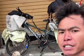 贵州小伙挑战冬季骑行西藏去拉萨市带着路上收养的小狗在路上遇到了下雨天，天也快黑了前面有野生动物出现不敢走了#318川藏线 #骑行西藏 #想去的地方总有一天会抵达 #上热门视频封面
