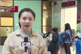 广州流感来袭 医院患者排队看病