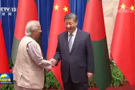 习近平会见孟加拉国临时政府首席顾问尤努斯图片