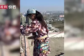 女子为赚钱养家做十多年高空油漆工：年纪越大干得越害怕图片